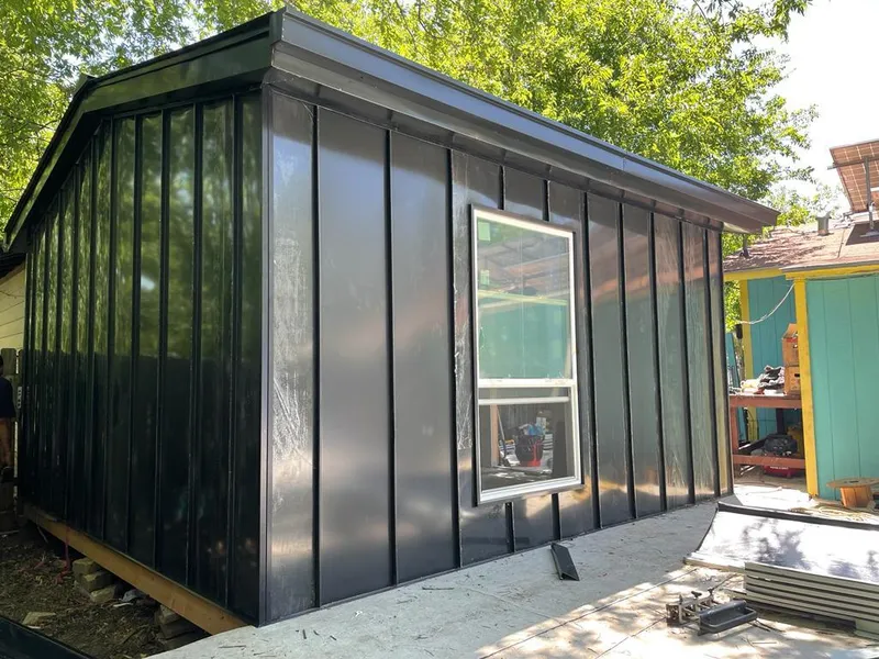 Black standing seam metal wall panels for Roof Inspection in South Lebanon